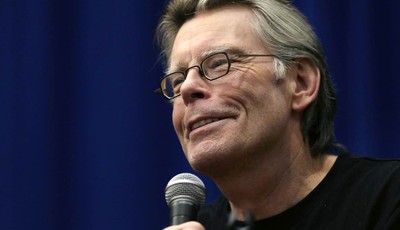 
              FILE - This Dec. 7, 2012 file photo shows novelist Stephen King speaking to creative writing students at the University of Massachusetts-Lowell in Lowell, Mass. A signed copy of a rare 